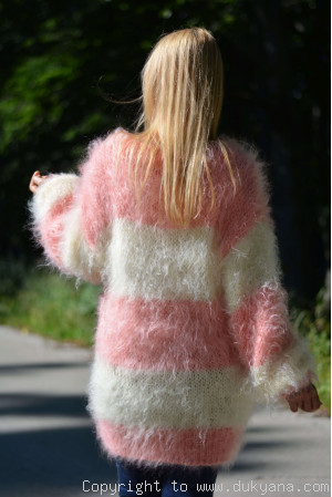 Oversized striped mohair sweater loosely knitted in cream and peach
