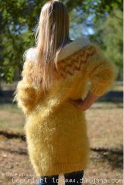 Handknit off-shoulder fuzzy mohair dress in golden yellow
