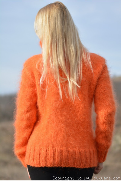 Cabled Tneck mohair sweater in bright orange