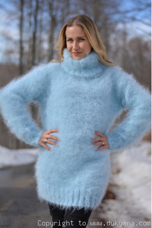 Fluffy mohair turtleneck sweater in light blue