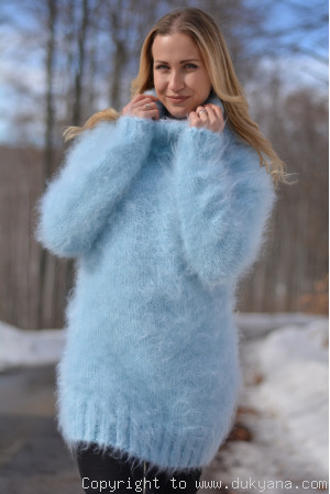Fluffy mohair turtleneck sweater in light blue