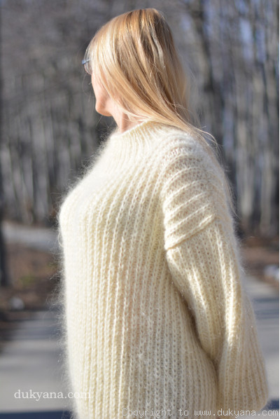 Mens knitted sweater with a funnel neck in cream