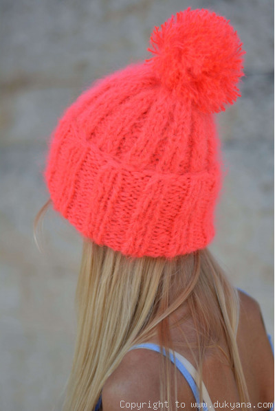 Warm winter ski hat with pompon