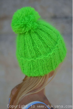 Warm winter ski hat with pompon