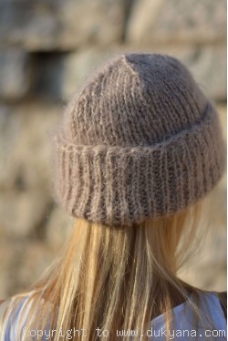 Warm winter beanie knitted in beige