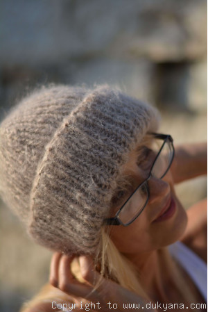 Warm winter beanie knitted in beige