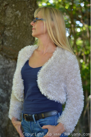 Soft fuzzy and furry ladies bolero in tan beige