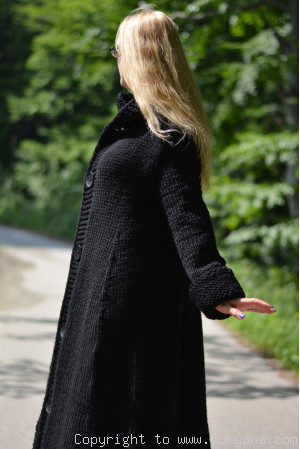 Long flared wool cardigan with a hood knitted in black