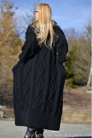 Merino blend hooded cabled cardigan knitted in black