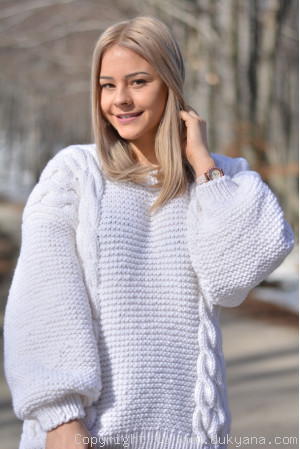 Cabled merino blend sweater in white